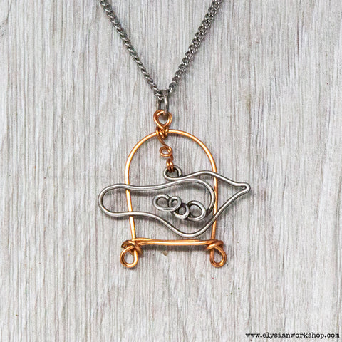 Sterling Silver and Copper Wire Bird in a Cage on Stainless Steel Pendant Necklace